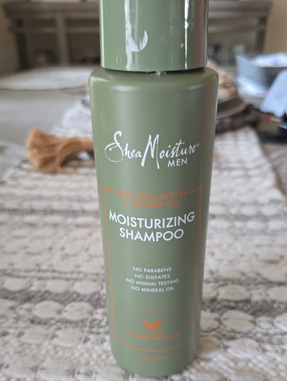 Shea Moisture Men Moisturizing Shampoo in Olive Green Bottle